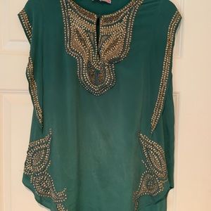 Calypso silk top with gold grommets